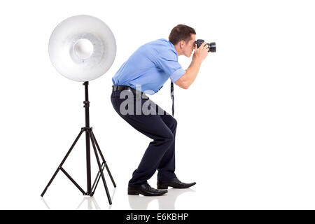 erfolgreiche junge Fotografen fotografieren im studio Stockfoto