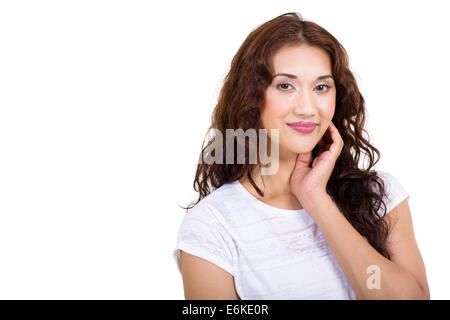 stilvolle junge Frau schaut in die Kamera auf weißem Hintergrund Stockfoto