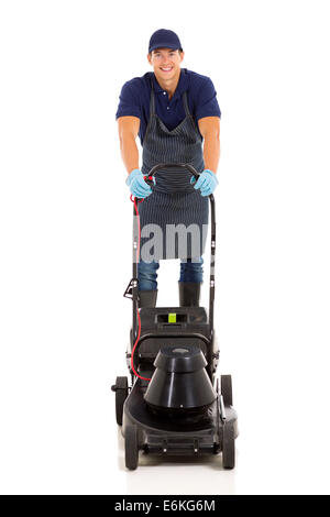 professionelle junge Gärtner mit Rasenmäher isoliert auf weiss Stockfoto