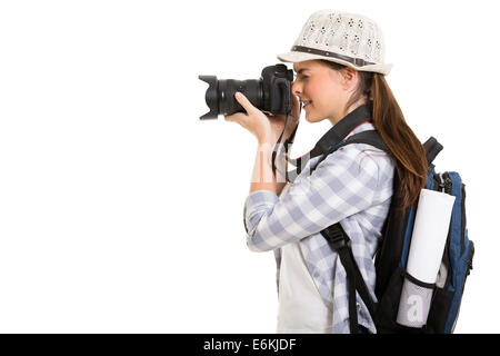 glückliche junge Frau mit Digitalkamera auf weißem Hintergrund Stockfoto