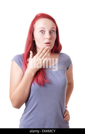 schockiert junge Frau mit Augen und Mund weit offen Stockfoto