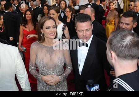 US-Schauspieler Angelina Jolie und Brad Pitt teilnehmen der 86. Oscarverleihung aka Oscars im Dolby Theatre in Los Angeles, USA, am 2. März 2014. Foto: Hubert Boesl Stockfoto