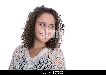 Schöne isolierte junge Frau mit locken wir seitwärts auf Text. Stockfoto