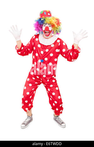 In voller Länge Portrait eines männlichen Clown gestikulieren mit den Händen isoliert auf weißem Hintergrund Stockfoto