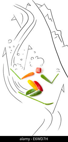 Obst und Gemüse in Form von Slalom Ski Skifahren zwischen Polen. Stockfoto