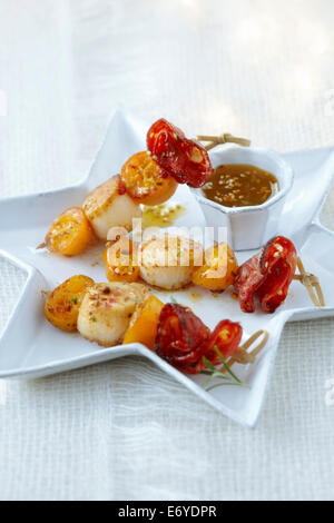 Jakobsmuschel, Kumquat und Chorizo Spieße Stockfoto