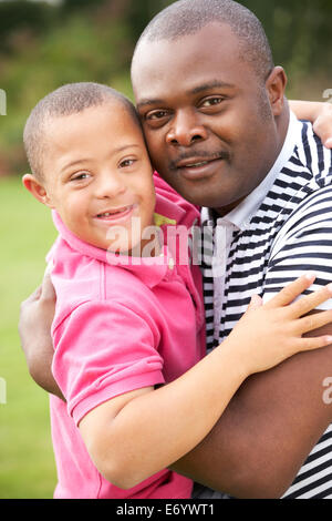 Vater mit Down-Syndrom-Sohn Stockfoto