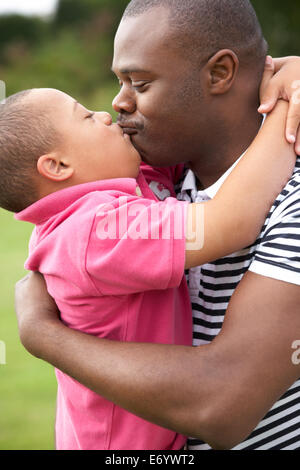 Vater mit Down-Syndrom-Sohn Stockfoto