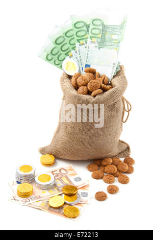 Tasche mit Cookies und Geld über weiß Stockfoto