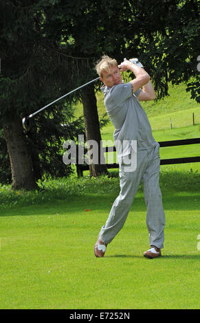 Going, Österreich. 03rd September 2014. Ehemalige finnische Formel 1 Fahrer Mika Haekkinen spielt eine Runde Golf im "Kaiser Trophy" golf-Turnier im Rahmen der Veranstaltung "Camp Beckenbauer" in Reith, Österreich, 3 Septmeber 2014. © Dpa picture-Alliance/Alamy Live News Stockfoto