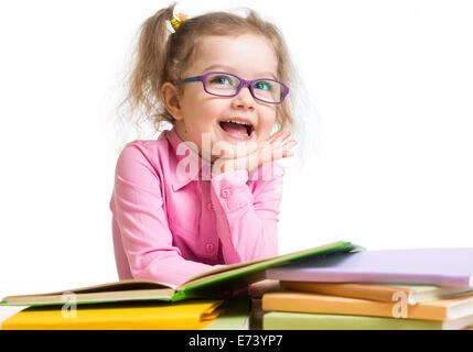 Lustige Kinder Mädchen in Gläsern, die Bücher zu lesen Stockfoto