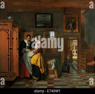 Innenraum mit Frauen neben einem Wäsche-Schrank - von Pieter de Hooch, 1663 Stockfoto