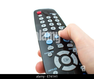 TV-Fernbedienung steuern Sie in der hand isoliert closeup Stockfoto