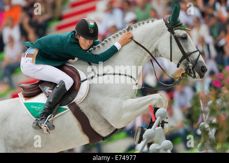 Caen, Frankreich. 06. Sep, 2014. Reiter Bertram Allen Irlands auf Pferd «Molly Malone V» konkurriert in der Geschwindigkeit springen Wettbewerb während der World Equestrian Games 2014 in Caen, Frankreich, 6. September 2014. Foto: Rolf Vennenbernd/Dpa/Alamy Live News Stockfoto