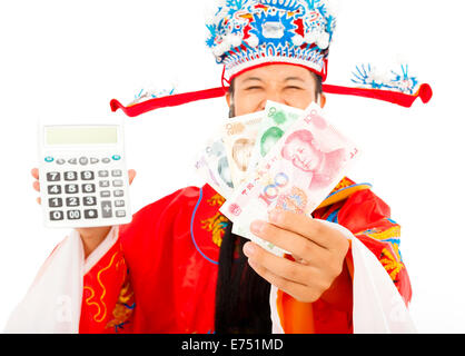 Gott des Reichtums hält einen Rechen-Maschine und chinesische Währung Stockfoto