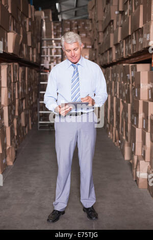 Lagerleiter in Zwischenablage schreiben Stockfoto