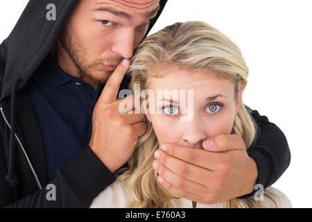 Diebstahl, die junge Frau den Mund zu Stockfoto