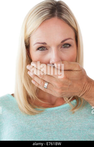 Hand, die junge Frau den Mund zu Stockfoto