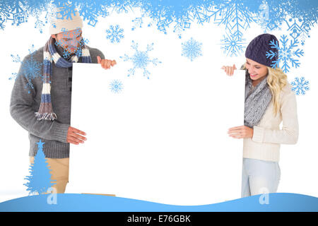 Zusammengesetztes Bild attraktives Paar in Wintermode zeigen, Plakat Stockfoto