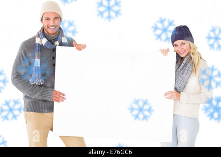Zusammengesetztes Bild attraktives Paar in Wintermode zeigen, Plakat Stockfoto