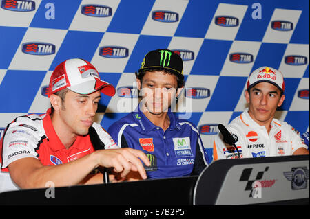 Misano Adriatico Rimini, Italien. 11. September, 2014. Pressekonferenz für die MotoGP San Marino und Rimini Grand Prix statt auf dem Misano World Circuit Marco Simoncelli. 11.09.2014. Misano Adriatico Rimini, Italien. Pressekonferenz für die MotoGP San Marino und Rimini Grand Prix statt auf dem Misano World Circuit Marco Simoncelli. Valentino Rossi, Andrea Dovizioso und Marc Marquez Credit: Action Plus Sport/Alamy Live News Stockfoto
