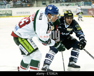 Ingolstadt, Bayern. 14. Sep, 2014. von links 83Adrian GRYGIEL/Augsburg, 39 Thomas GREILINGER/Ingolstadt.second Spieltag der deutschen Eishockeyliga. ERC Ingolstadt Vs Augsburger Panther, der deutsche Meister erhält man die finanziell schwächeren Teams. Bildnachweis: Wolfgang Fehrmann/Wolfgang Fehrmann/ZUMA Draht/Alamy Live News Stockfoto