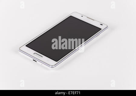 Weiße moderne Smartphone mit schwarzem Bildschirm auf der Oberfläche liegt isoliert auf weißem Hintergrund. Selektiven Fokus Stockfoto