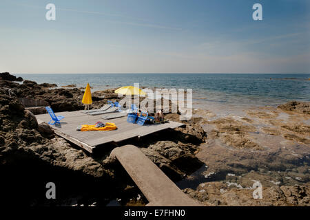 Sonnenbad am Punto Righini Castiglioncello Tuscany Stockfoto