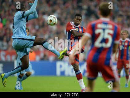 München, Deutschland. 17. Sep, 2014. Bayern David Alaba hat den Ball während der Fußball-UEFA Champions League-Gruppe E zwischen FC Bayern München und Manchester City in München, 17. September 2014 übereinstimmen. Foto: Andreas Gebert/Dpa/Alamy Live-Nachrichten Stockfoto