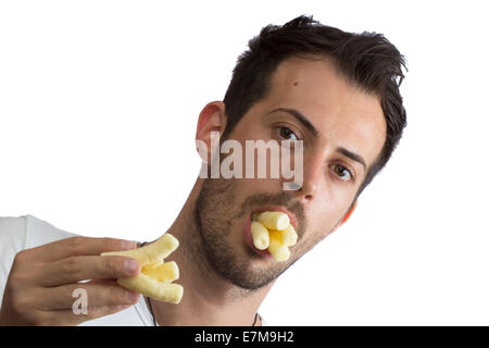 Mann isst Puffs isoliert auf weißem Hintergrund Stockfoto