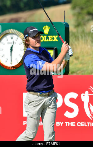 Newport, Wales, UK. 21. September 2014. Eddie Pepperell aus England Abschlag am 1. am letzten Tag des The Wales Open. Robert Timoney/AlamyLiveNews Stockfoto