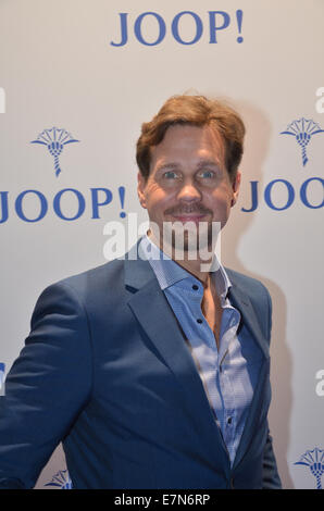 Prominenten Besuch Joop Store Opening am Koe Bogen.  Mitwirkende: Thomas Heinze Where: Düsseldorf bei: 19. März 2014 Stockfoto