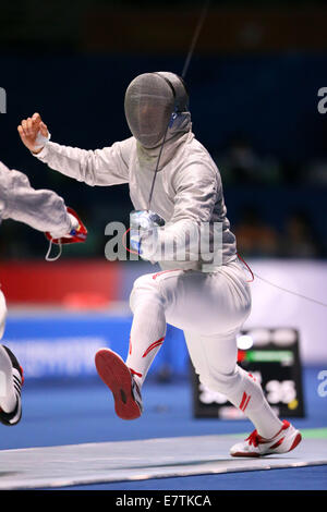 Incheon, Südkorea. 24. Sep, 2014. / Kenta Tokunan (JPN)-Fechten: Säbel Team am Dowon Gymnasium während der 2014 Incheon asiatische in Incheon, Südkorea Spiele. Bildnachweis: Aflo Co. Ltd./Alamy Live-Nachrichten Stockfoto