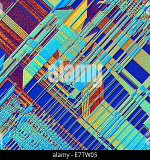 Computer-Chip. Farbiges Licht Schliffbild der Oberfläche eines ICs auf einem Computer. Diese integrierte Schaltung erzielt worden durch Prägung mikroskopisch kleine elektronische Bauteile auf der Oberfläche von einem Silizium-Wafer. Integrierte Schaltungen können Mu gemacht werden Stockfoto