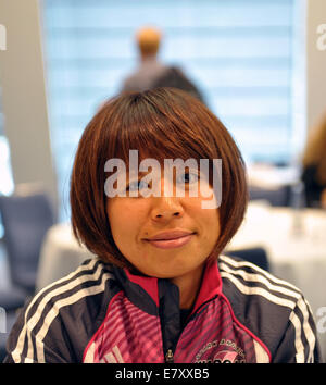 Berlin, Deutschland. 25. Sep, 2014. Langstreckenläufer Kayoko Fukushi Japan beteiligt sich an einer Pressekonferenz anlässlich der 41. Auflage des Berlin-Marathon in Berlin, Deutschland, 25. September 2014. Bildnachweis: Dpa picture Alliance/Alamy Live News Stockfoto