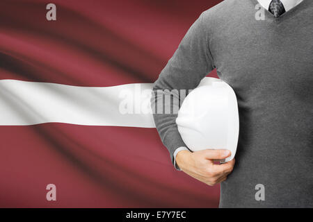 Architekt mit Flagge auf Hintergrund - Lettland Stockfoto