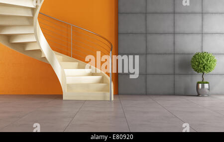 Modernes Zimmer mit Holztreppe und Eisen-Panel an Wand Stockfoto