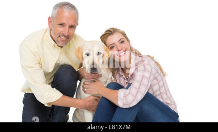 Brautpaar mit ihrem Haustier Hund Stockfoto