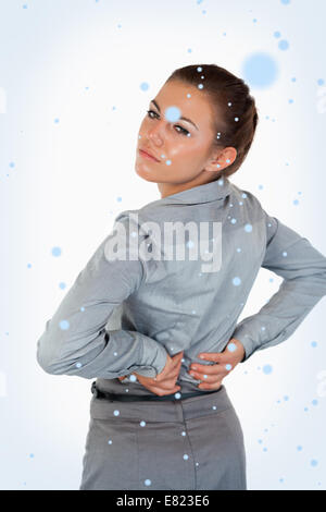Porträt von müde Geschäftsfrau mit Rückenschmerzen Stockfoto