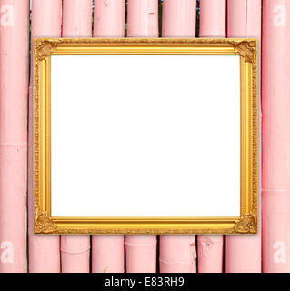 leere Goldrahmen auf Bambus Wand Hintergrund Stockfoto
