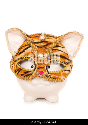 Piggy Bank tragen Tiger Maskerade Maske Ausschnitt Stockfoto