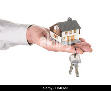 Hand mit Haus und Schlüssel Stockfoto