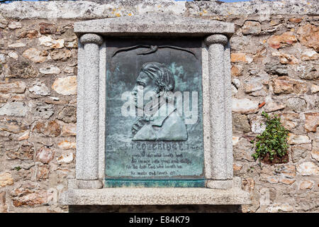 Gedenktafel an der Dichter Coleridge auf einem Stein Wand auf dem Kirchhof von St. Mary, schon St Mary, Devon. Stockfoto