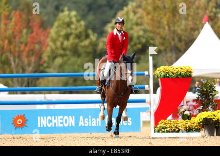 Incheon, Südkorea. 30. September 2014. Taizo Sugitani (JPN) Pferdesport: Springen individuelle Finale im Dream Park Pferdesport Veranstaltungsort während der 2014 Spiele Incheon asiatische in Incheon, Südkorea. © AFLO SPORT/Alamy Live-Nachrichten Stockfoto