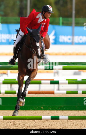 Incheon, Südkorea. 30. September 2014. Taizo Sugitani (JPN) Pferdesport: Springen individuelle Finale im Dream Park Pferdesport Veranstaltungsort während der 2014 Spiele Incheon asiatische in Incheon, Südkorea. © AFLO SPORT/Alamy Live-Nachrichten Stockfoto