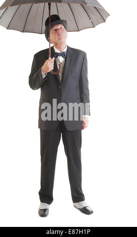 Applying Geschäftsmann im Retro-Anzug mit Dach isoliert auf weiss. Stockfoto