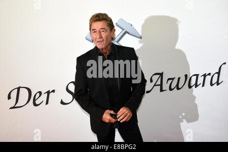 Hattingen, Deutschland. 3. Oktober 2014. Musiker Peter Maffay kommt nach der 10. Steiger Awards in Hattingen, Deutschland, 3. Oktober 2014. Foto: Henning Kaiser/Dpa/Alamy Live News Stockfoto