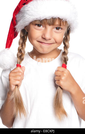 Kleines Mädchen mit Weihnachtsmütze Stockfoto