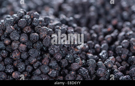 Haufen von getrockneten Chokeberries als Hintergrundbild oder als Textur Stockfoto