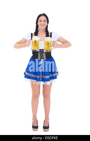 Hübsches Oktoberfest Mädchen halten Bier Humpen Stockfoto